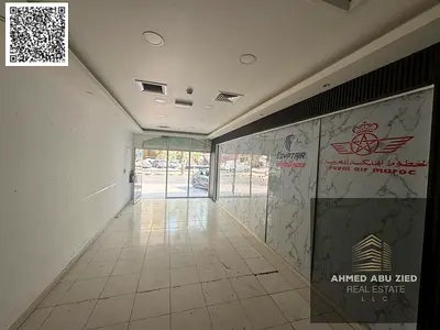محل تجاري مميز للإيجار في عجمان | النعيمية 2 شارع الملك فيصل الحيوي يصلح لجميع الانشطه التجاريه بمساحة ممتازة وحمام داخلي بـ 32,000 درهم | 4 دفعات