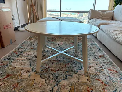 White round wooden coffee table - sturdy, good condition