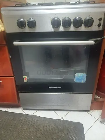 Used freestanding gas oven with stovetop - working condition