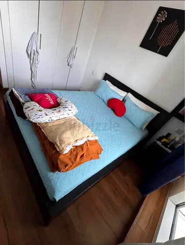 Dark wood bed | Storage and Side Table