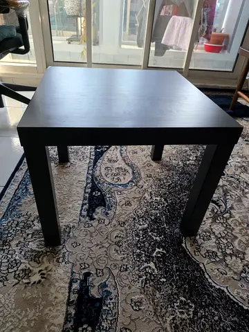 Solid wood coffee table and small ikea side table for urgent sale. Along with a big wall mirror free