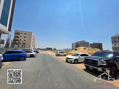 Commercial Land for Sale in Al Alia Global, Ajman – 4,350 Sq Ft | Licensed G+4 | Freehold for All 