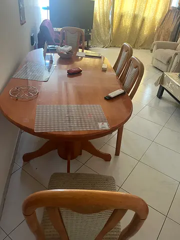 Solid wood dining table with 6 chairs - good condition