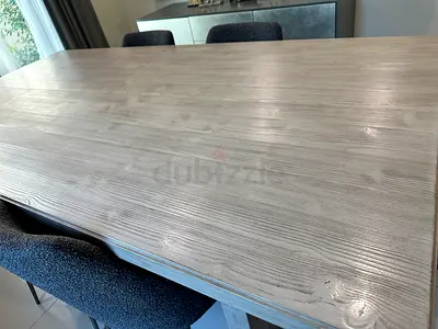 Solid wood dining table in light grey finish - seats 6