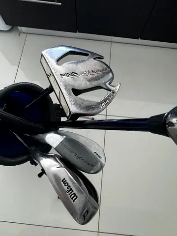 A set of 4 golf clubs (bag not included)