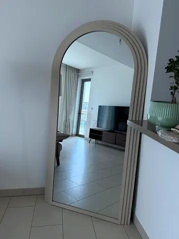 Full-length arched mirror