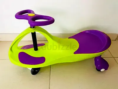 Childrens Wiggle Car Ride-On Toy - Green  Purple, Good Condition