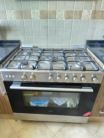 Midea 5-burner Gas Cooker with Oven - Stainless Steel, Good Working Condition