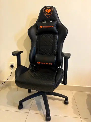 Cougar black leather gaming chair with lumbar and neck support