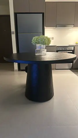 Round black pedestal dining - modern compact design from Crate Barrel