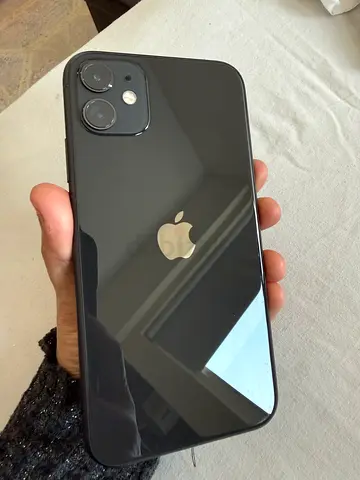 iPhone 11 (working) with battery health 71% — good condition, unlocked. The scratch guard is crack.
