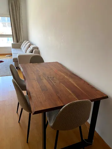 Solid wood dining table - natural finish, good condition