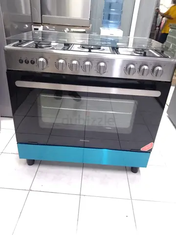 Hisense brand 5 burner Stainless Steel Gas Range with Oven - Good Condition