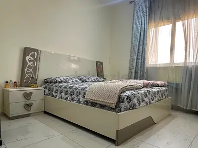 White double bed with matching bedside table - good condition