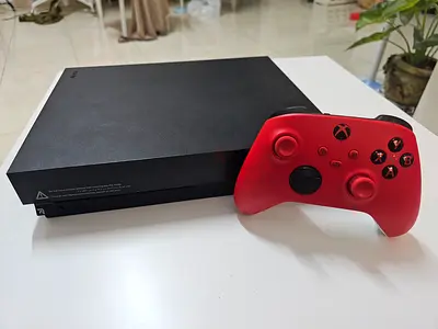 Xbox One X  console  1 TB with red wireless controller - Perfect working condition.