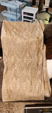 Beige patterned sheet curtains- good condition, dry cleaned 230 cm long  wide 4 pieces for 100 aed