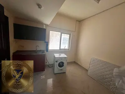 Annual RentalThe Most Affordable and Beautiful Studio in Sharjah with a SemiSeparated Kitchen Centr