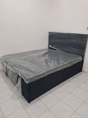 Queen storage bed with mattress , wrapped