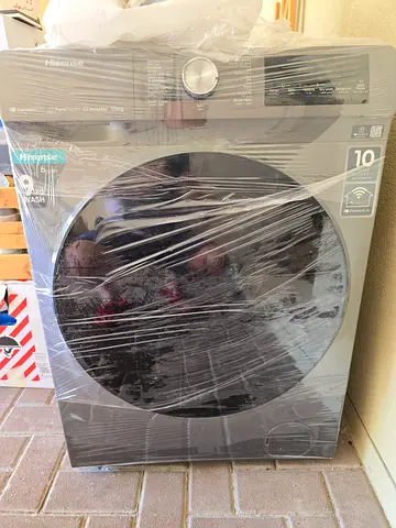 Front-load washing machine in good condition (wrapped) - 9kg