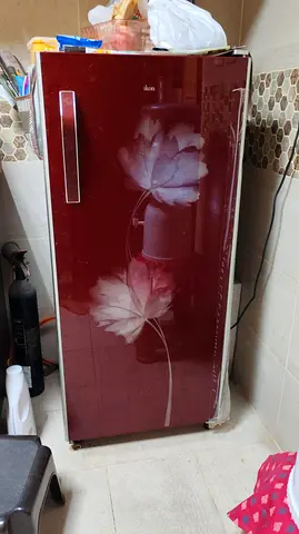 Single-door Maroon Fridge with Floral Design - Good Working Condition