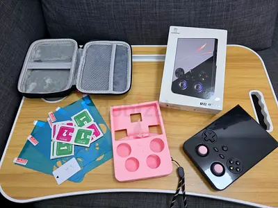 Anbernic RG477V Portable console with accessories (case, screen protectors, silicone grip, charger)