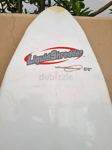 Liquid Shredder 64 Surfboard - Used Condition Suitable for kids as soft board, needs new leg strap