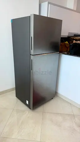 Used double-door stainless steel refrigerator - good condition(just 1 year used) . As good as new