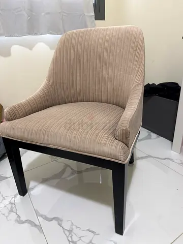 Beige Upholstered Accent Chair with Black Wooden Legs
