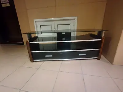 Glass Top TV Stand with Black Shelves and Wooden Sides