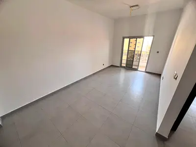 Neat Residential Property with Central A/C, Balcony & Free Maintenance | Prime Location in Al Rawda