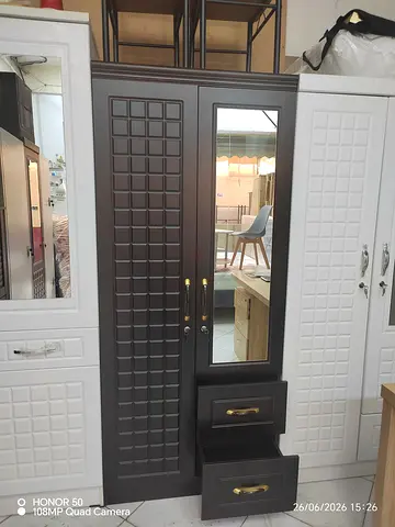 Dark wood wardrobe with mirror and drawers - good condition
