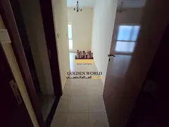 For annual rent, a room and a hall with free air conditioning in a prime location in Sharjah, modern