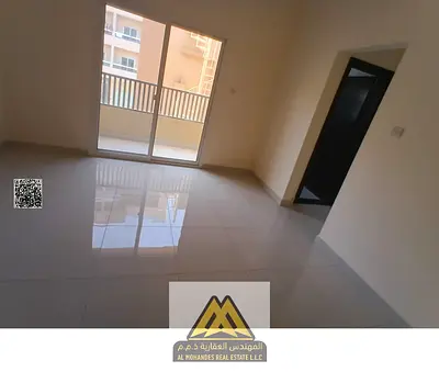 1-bedroom apartment for annual rent in Al Rawda 1, Ajman. First tenant, balcony, 2 bathrooms, central A/C, AED 35,000 yearly, payable in 4 installment