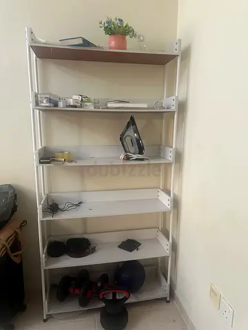 Tall white metal shelving unit with 5 shelves — good condition