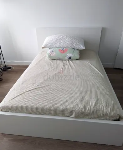 Malam double  bed 140/200cm bed and Ikea mattress is available in excellent condition,