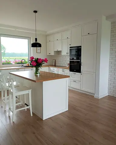 Kitchen island with wooden top with storage cabinet