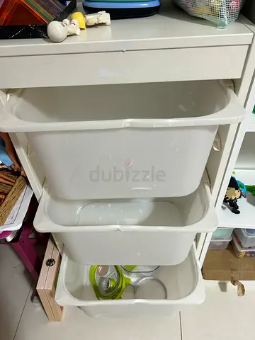 IKEA Trofast-style white storage unit with three removable bins