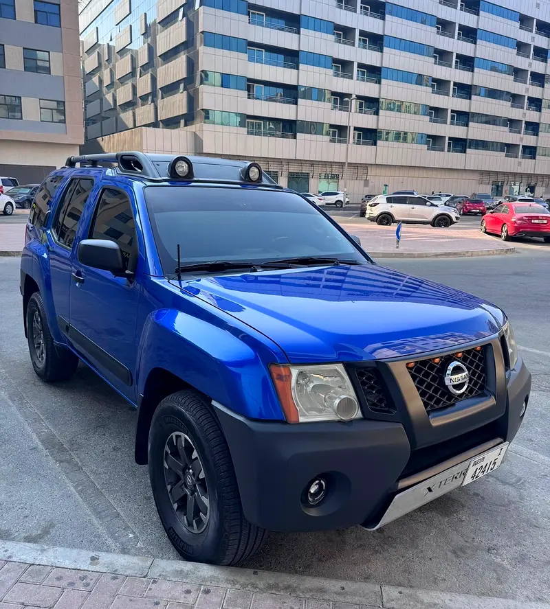 Nissan Xterra 2014 — photo 1 of 9