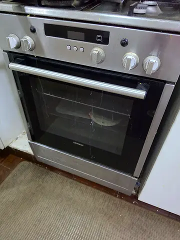 Used built-in stainless steel electric oven in working condition