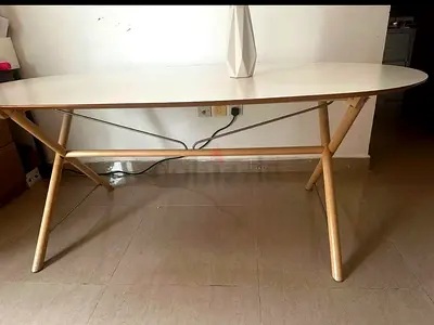 White oval dining table with wooden legs - good condition