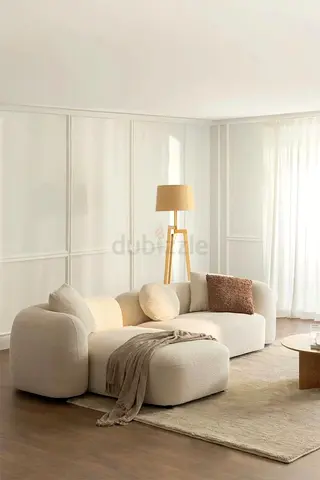 Beige Curved Modular Sofa with Ottoman – Modern Minimalist