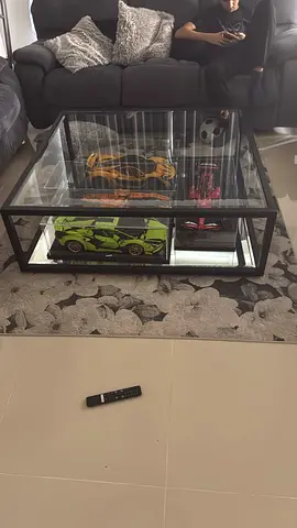 Glass Top Display Coffee Table with Black Metal Frame