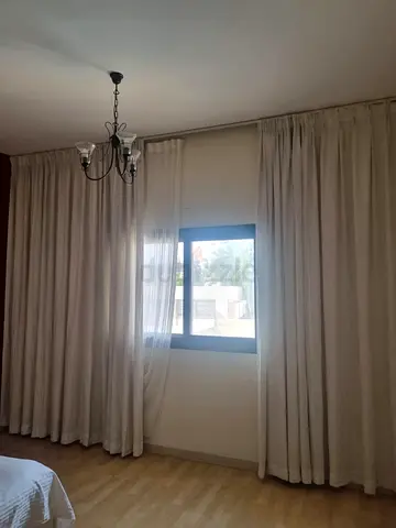 Premium Full-length beige curtains with roller blind — good condition