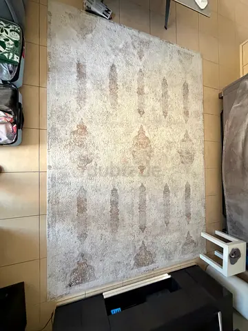 Lights beige patterned area rug