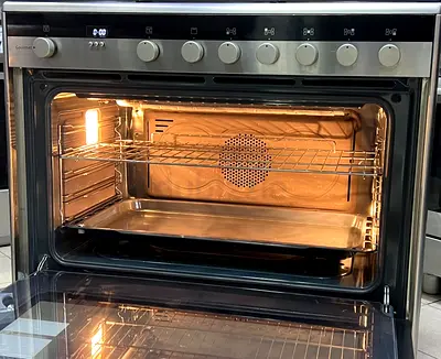 Stainless Steel Electric Oven with Fan and Lights - Good Condition