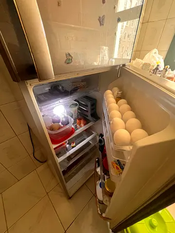 Double-door fridge in good working condition — ideal for kitchen or office