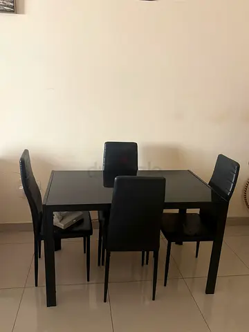 Black 4-Seater Glasstop Dining Table with Chairs - Good Condition