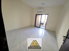 A spacious 2-bedroom apartment in a prime location opposite Day To Day, featuring a balcony