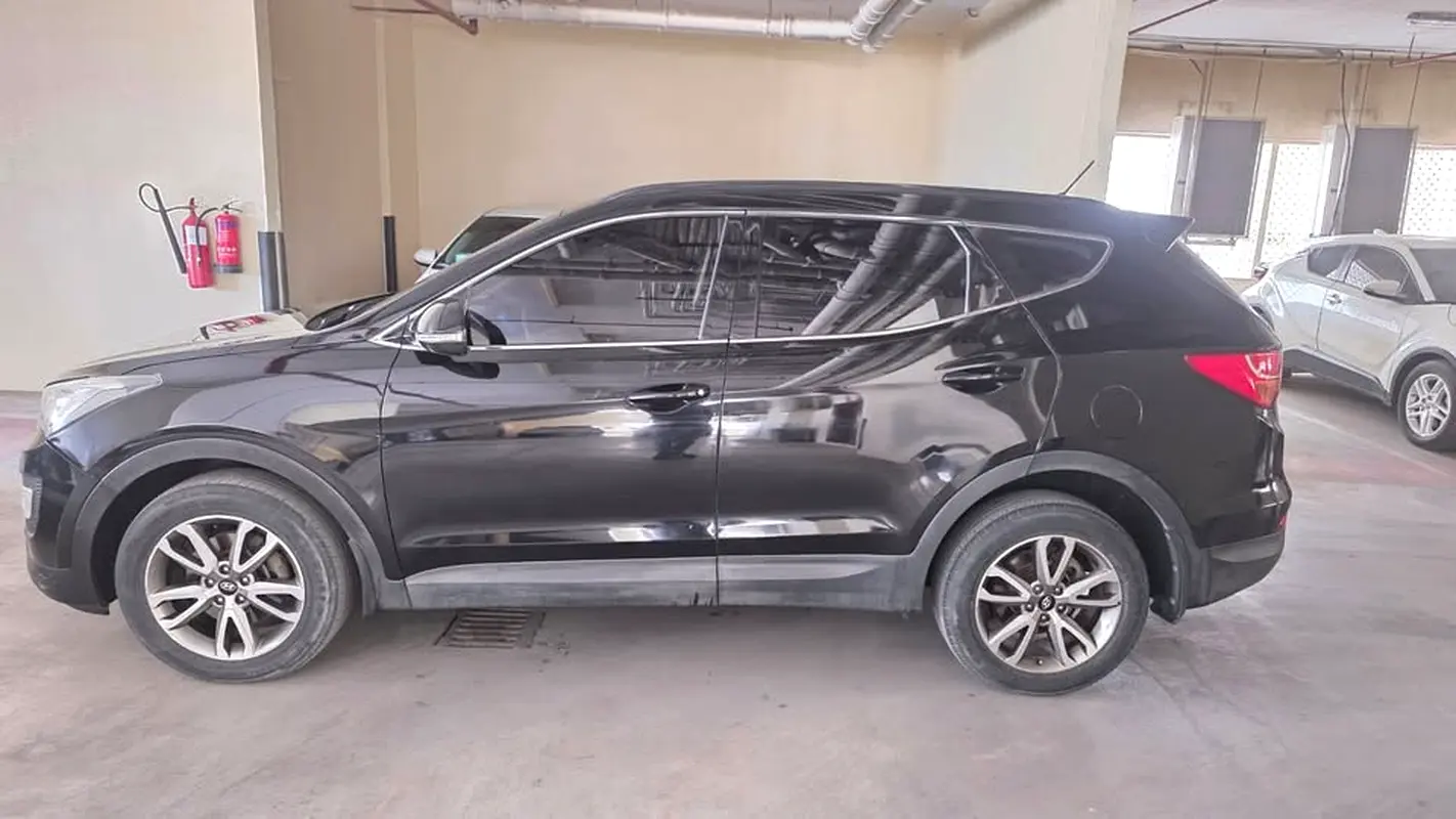 Hyundai Santa Fe 2015 — photo 1 of 11