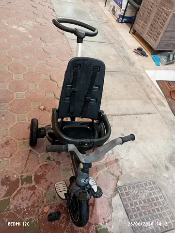 Used baby pushcycle with seat cover in perfect condition